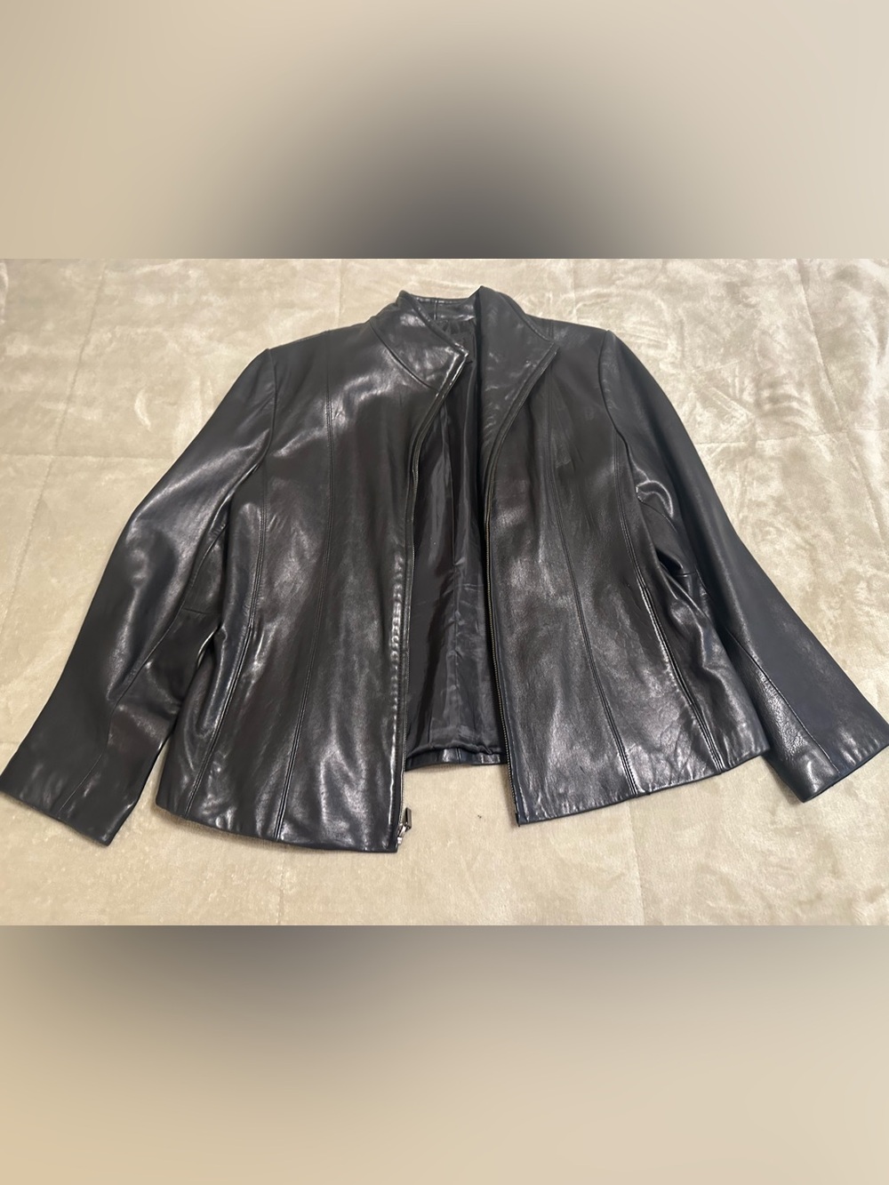 Women’s Black Leather Jacket with a few blemishes. Please see photos.